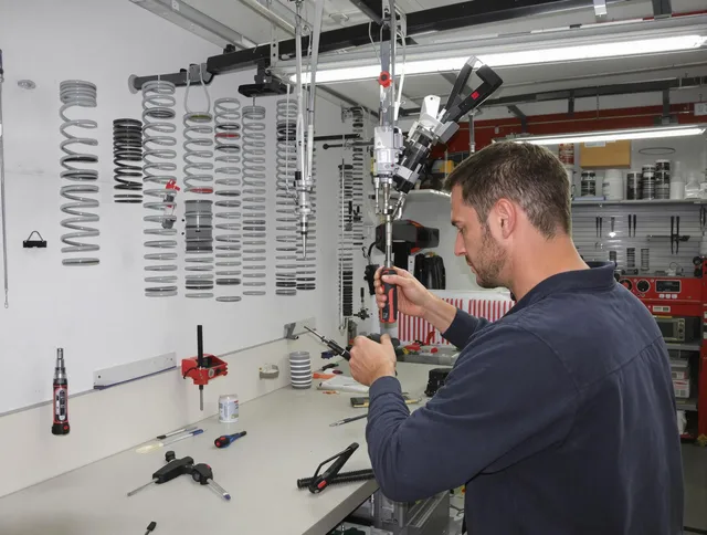 Kannapolis Garage Door Repair safety certified technician performing precision spring replacement in Kannapolis
