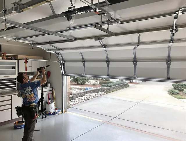 Garage door track repair service by Kannapolis Garage Door Repair in Kannapolis